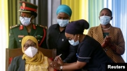 Perezida wa Tanzaniya Samia Suluhu Hassan yikingiza Covid 19 taliki 28 z'ukwezi kwa karindwi 2021