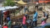 Residents of the Nazon neighborhood displaced by gang violence construct a tent encampment in Port-au-Prince, Haiti, Nov. 15, 2024.