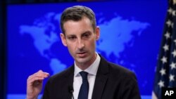 State Department spokesperson Ned Price speaks during a press briefing at the State Department in Washington, Tuesday, Feb. 2, 2021. (Nicholas Kamm/Pool via AP)