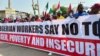 FILE - Nigerians protest against high cost of living and massive suffering following an increase in fuel prices in Abuja, Nigeria, Feb. 27, 2024.