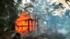 Rumah-rumah terbakar di desa Gawdu Zara, negara bagian Rakhine utara, Myanmar, 7 September 2017. (Foto AP, Berkas)