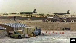 American military planes and support facilities are seen at the Al Udeid Air Base outside Doha, Qatar in the Persian Gulf. (File Photo)