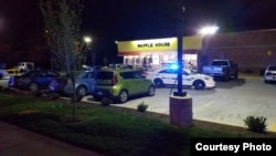 A police car is seen outside a Waffle House restaurant near Nashville, where three people were killed, 22 April, 2018. (Courtesy: Metropolitan Nashville Police Department)