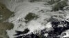 This image made available by NOAA shows storm systems over the eastern half of the United States on, Feb. 7, 2013.