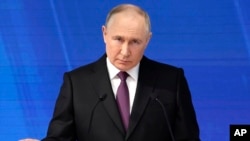 Presiden Rusia Vladimir Putin menyampaikan pidato kenegaraannya di Moskow, Rusia, Kamis, 29 Februari 2024. (Foto: via AP)