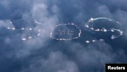 Commercial fishermen, mariners form "SOS" to spread message of saving oceans from acidification caused by fossil fuel emissions, Homer, Alaska, Sept. 6, 2009.