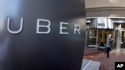 FILE - Uber, with headquarters in San Francisco.