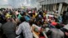 Stampede in Kenya as Slum Residents Surge for Food Aid