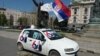 Pristalice SNS ispred zgrade Narodne skupštine Srbije počele su da pristižu još juče iz cele Srbije, Foto: VOA