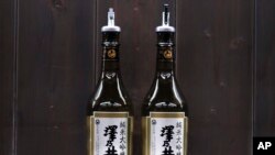 Bottles of Sawanoi, a Japanese sake brand by Ozawa Sake Brewery, are prepared for tasting at a room during a media tour at the brewery in Ome, on the western outskirts of Tokyo, Nov. 13, 2024.