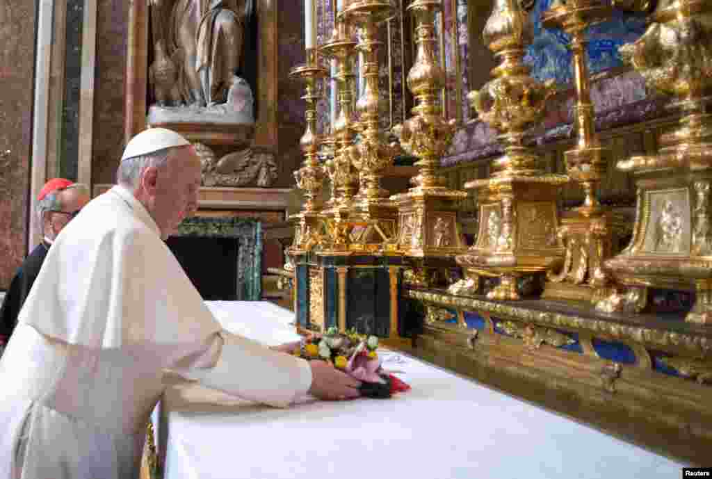 "He has to work hard and unite all the churches and leaders in the world so that people live in peace and harmony." Jimmy Jackson, Kator, Juba Newly elected Pope Francis makes a private visit to the 5th-century Basilica of Santa Maria Maggiore, in a photo released by Osservatore Romano in Rome, March 14, 2013.