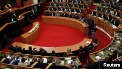 Ivory Coast's President Alassane Ouattara addresses the Ivorian parliament during the presentation of a new constitution project in Abidjan, Oct. 5, 2016. 