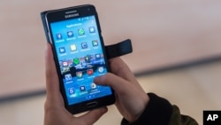 Smartphone Android dan Google App (Foto: ilustrasi).