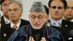 Afghan President Hamid Karzai delivers a speech (July 8 2012 file photo)
