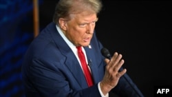 Owayengumongameli uMnu Trump ekungxoxompikiswano loNkosikazi Harris