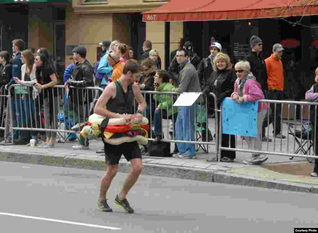 Photos of the two suspects near the finish line of Boston Marathon. (Courtesy Bob Leonard)