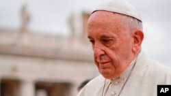 In this photo dated Wednesday, April 11, 2018, Pope Francis arrives in St.Peter's Square at the Vatican for his weekly general audience. An extraordinary letter published Wednesday April 11 said the Pope had made "grave mistakes" in dealing with an abuse crisis in Chile. (AP Photo/Andrew Medichini) 