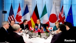 Presiden AS Barack Obama dalam pertemuan pemimpin G7 dalam KTT Keamanan Nuklir di Den Haag (24/3). (Reuters/Jerry Lampen)