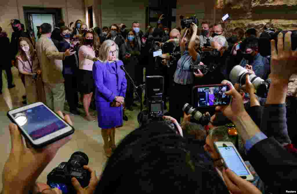 U.S. Representative Liz Cheney (R-WY) speaks to the media as she arrives on Capitol Hill in Washington. House Republicans ousted her from a leadership post over her critisim of former President Donald Trump's false claims of a stolen election.