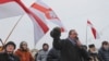 Belarus opposition activist Vyacheslav Sivchik speaks during a protest against the country's closer integration with Russia, which protesters fear could erode the post-Soviet independence of Belarus, in Minsk, Belarus, Dec. 29, 2019. 