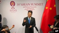 FILE - Chinese Vice Foreign Minister Le Yucheng speaks to reporters during ASEAN summit in Nonthaburi, Thailand, Nov. 4, 2019. 