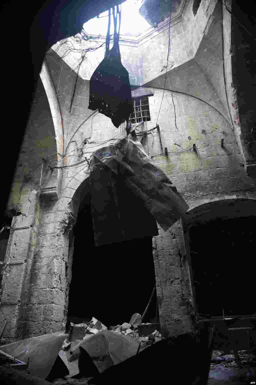 A picture shows damages in a section of the souk in the old city of Aleppo after the area was shelled by Syrian regime forces on September 30, 2012.