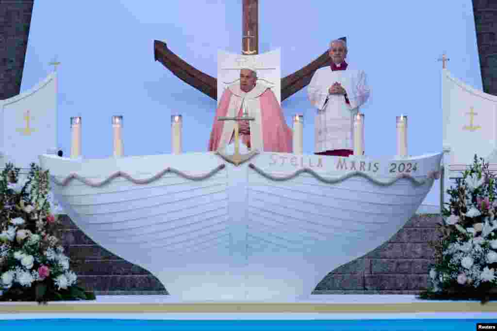 Pope Francis attends the Holy Mass at Place d'Austerlitz during his apostolic journey in Ajaccio on the French Mediterranean island of Corsica.