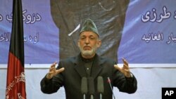 Afghan President Hamid Karzai speaks during a gathering in Kabul, Afghanistan, April 17, 2012.