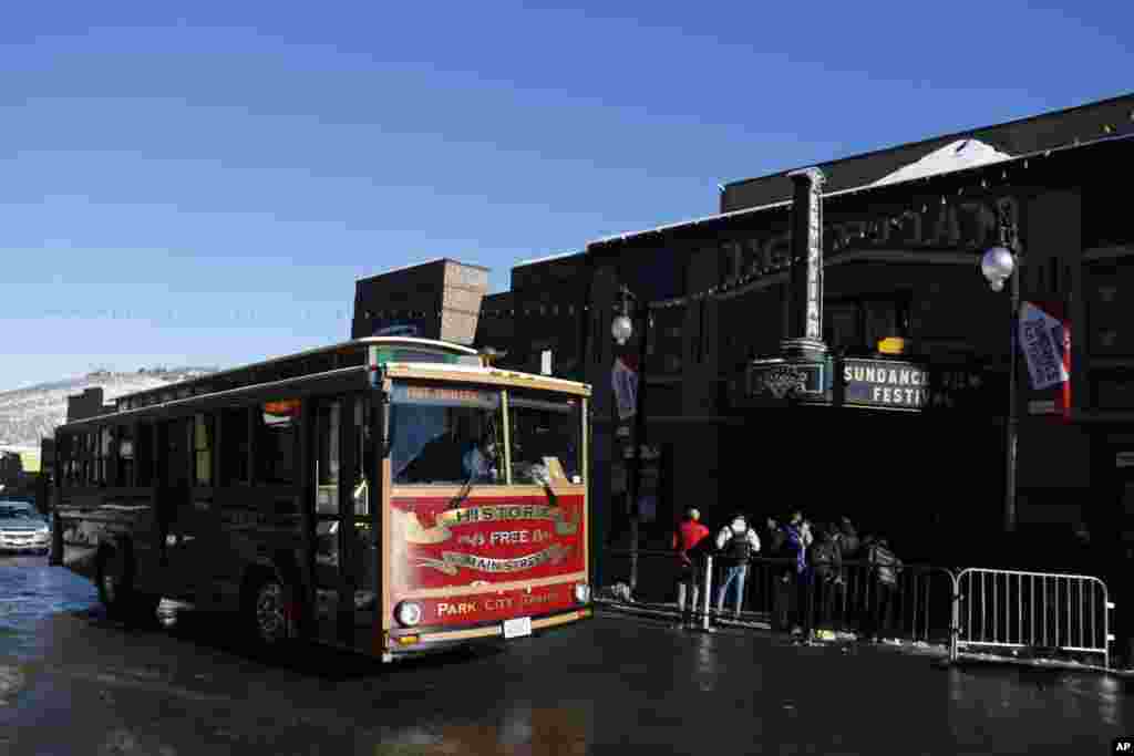 The Main Street Trolley passes the marquee at the Egyptian Theatre on Main Street during the 2013 Sundance Film Festival, January 17, 2013.