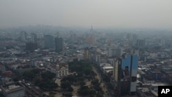 FILE - Smoke from wildfires fills the air in Manaus, Amazonas state, Brazil, Aug. 27, 2024.