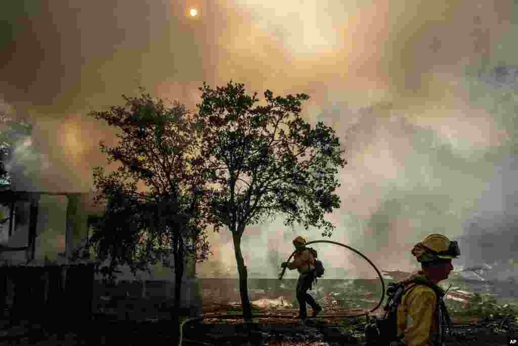 Firefighters battle the Boyles Fire in Clearlake, California, Sept. 8, 2024.