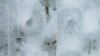Archivo - Huellas crean la forma de un corazón en un campo de rugby cubierto de nieve en Santiago de Chile, miércoles 8 de mayo de 2024. 