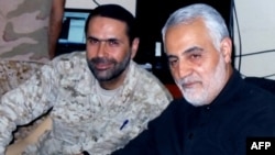 قاسم سلیمانی، فرمانده پیشین نیروهای سپاه پاسداران و وسام الحسن طویل، فرمانده پیشین حزب الله، 