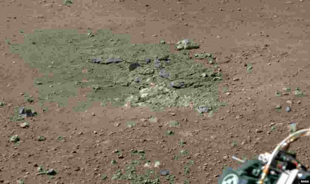 This image shows bedrocks that were exposed after Curiosity's rocket stage fired its engines that blew away soil from the Martian surface. The Mars rover is preparing to aim its laser next week at a rock in the first test of the instrument.