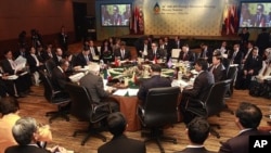 Foreign ministers meet during a plenary session of the 44th ASEAN Foreign Ministers Meeting in Nusa Dua, in Indonesia's resort island of Bali July 19, 2011.