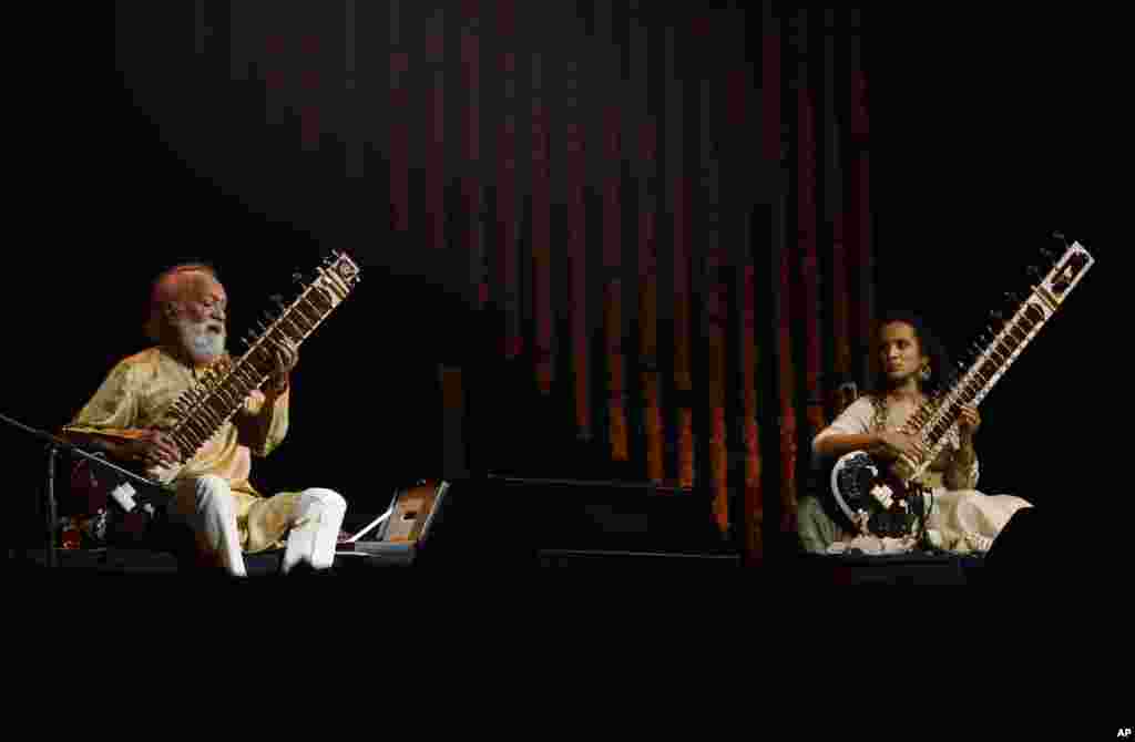 Indian musician and sitar maestro Ravi Shankar at a performance with his daughter Anoushka Shankar, Bangalore, India, February 7, 2012.