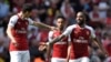 Le joueur d'Arsenal Alexandre Lacazette fête son but avec Granit Xhaka, à Londres, le 22 avril 2018.