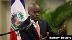 FILE - Haiti's President Jovenel Moise speaks during a news conference at the National Palace in Port-au-Prince. March 2, 2020. 