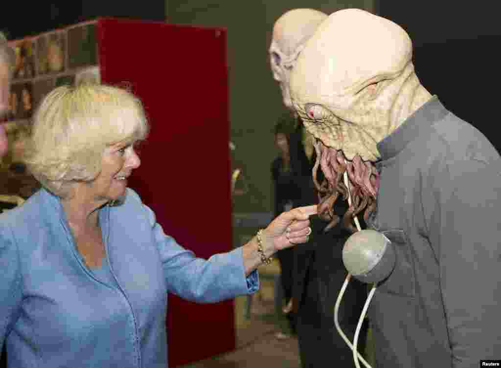 Britain's Camilla, Duchess of Cornwall, meets with an Ood during her visit to the set of the BBC One drama series Doctor Who, at Roath Lock Studios in Cardiff.