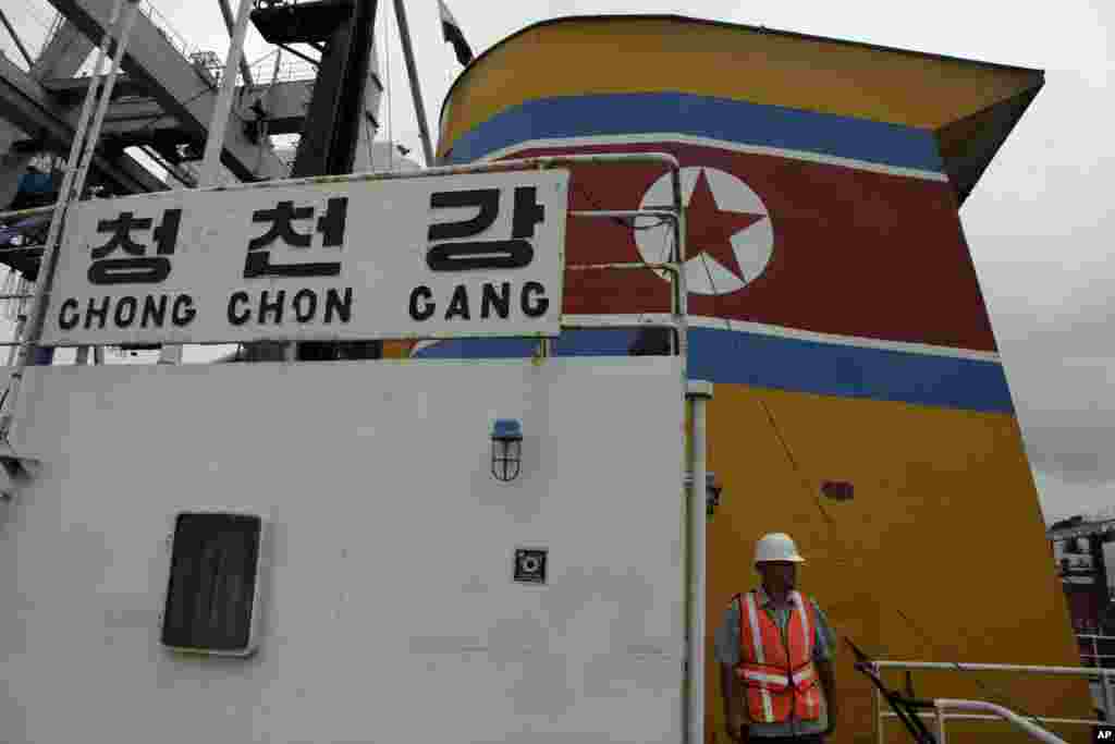 A security officer walks on the deck aboard a North Korean-flagged ship at the Manzanillo International container terminal, Colon City, Panama, July 16, 2013.