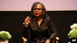 FILE - Anita Hill speaks at a discussion about sexual harassment at United Talent Agency in Beverly Hills, California, Dec. 8, 2017. 
