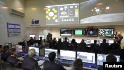 Team members of the Israel spacecraft, Beresheet, are seen in the control room in Yahud, Israel, April 11, 2019. 