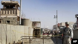 A US soldier gestures as he guards a NATO compound in Kabul, Afghanistan (file photo)
