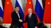 Президент Росії Володимир Путін і голова Китаю Сі Цзіньпін під час церемонії підписання угоди після їхніх переговорів у Великому Кремлівському палаці в Москві, Росія, 21 березня 2023 року. Сі та Путін хвалили один одного та говорили про глибоку дружбу. Фото Sputnik/AP