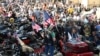 A crowd of motorcyclists is gathered at the Washington National Cathedral for the "Blessing of the Bikes," May 24, 2019, in Washington. The Rolling Thunder First Amendment Demonstration Run, a tradition since 1988, comes to an end this Memorial Day.