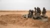 Des soldats mauritaniens à un avant-poste de la force opérationnelle G5 Sahel dans le sud-est de la Mauritanie, le long de la frontière avec le Mali, le 22 novembre 2018.