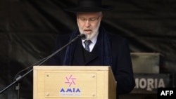 This photo taken July 18, 2017, shows Chief Rabbi Gabriel Davidovich delivering a speech during the commemoration of the 23rd anniversary of a terrorist bombing attack against a Jewish community center in Buenos Aires. 