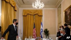 Secretary of State Antony Blinken, left, meets with Israeli Foreign Minister Yair Lapid in Rome, June 27, 2021. Blinken is on a week long trip in Europe traveling to Germany, France and Italy.