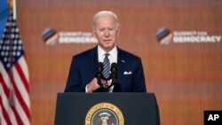 Rais Biden alipozungumza katika mkutano wa demokrasia akiwa katika ikulu ya Marekani Desemba 10, 2021, in Washington. (AP Photo/Evan Vucci)