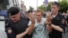 RUSSIA --Policemen detain Russian opposition leader Aleksei Navalny during a rally in support of investigative journalist Ivan Golunov, who was detained by police, accused of drug offense and later freed from house arrest, in Moscow, June 12, 2019.